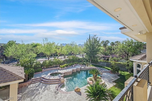 1809 White Hawk Ct, Las Vegas, NV 89134 - view of swimming pool featuring a pool with connected hot tub and a fenced backyard