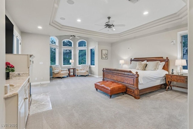 1809 White Hawk Ct, Las Vegas, NV 89134 - bedroom featuring a tray ceiling, light colored carpet, recessed lighting, and baseboards