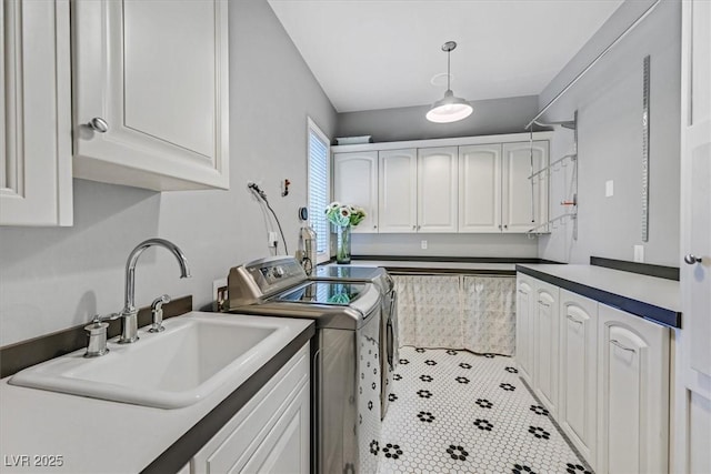 1809 White Hawk Ct, Las Vegas, NV 89134 - washroom with washing machine and dryer, cabinet space, and tile patterned flooring