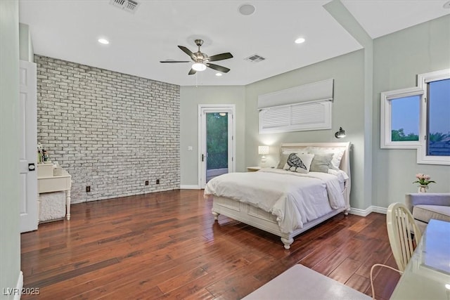 1809 White Hawk Ct, Las Vegas, NV 89134 - bedroom with brick wall, access to exterior, wood finished floors, baseboards, and ceiling fan