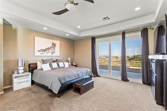 9301 Queen Charlotte Dr, Las Vegas, NV 89145 - bedroom with light colored carpet, access to exterior, a raised ceiling, recessed lighting, and a ceiling fan