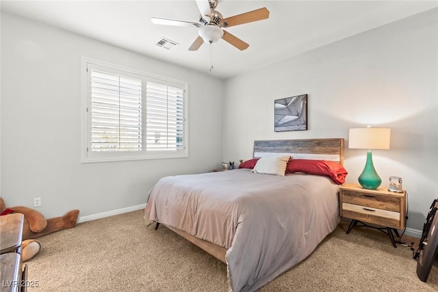 9301 Queen Charlotte Dr, Las Vegas, NV 89145 - bedroom with light colored carpet, baseboards, and ceiling fan