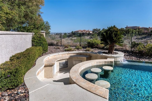 9301 Queen Charlotte Dr, Las Vegas, NV 89145 - view of pool with a pool with connected hot tub