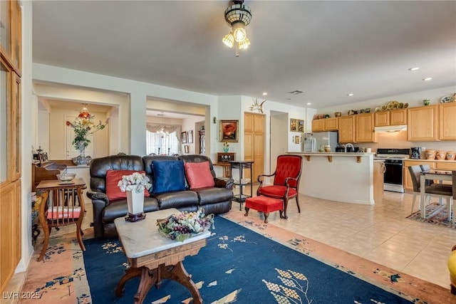 10361 Profeta Ct, Las Vegas, NV 89135 - living room featuring light tile patterned floors, recessed lighting, and a ceiling fan