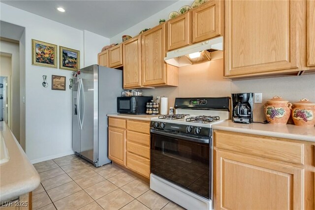 10361 Profeta Ct, Las Vegas, NV 89135 - kitchen featuring range with gas cooktop, under cabinet range hood, stainless steel fridge, light brown cabinets, and black microwave