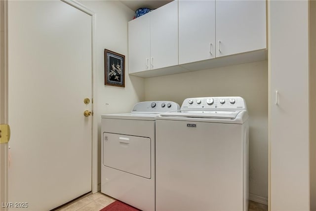 10361 Profeta Ct, Las Vegas, NV 89135 - laundry area featuring washer and dryer, cabinet space, and light tile patterned floors