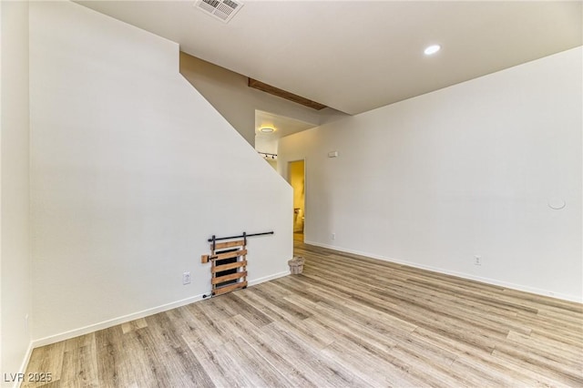 7900 Dutch Canyon Ct, Las Vegas, NV 89131 - unfurnished living room featuring light wood-style flooring and recessed lighting