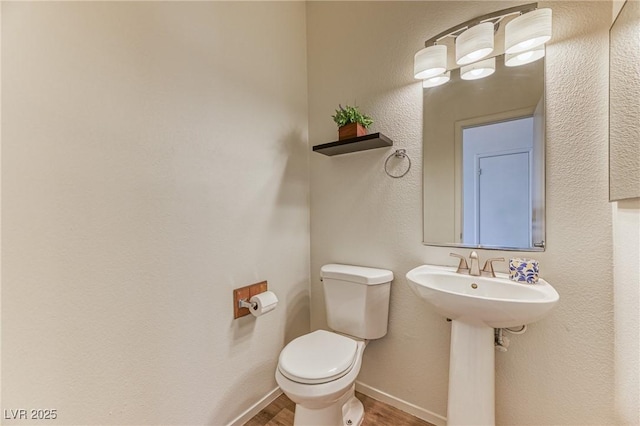 7900 Dutch Canyon Ct, Las Vegas, NV 89131 - bathroom with wood finished floors and toilet