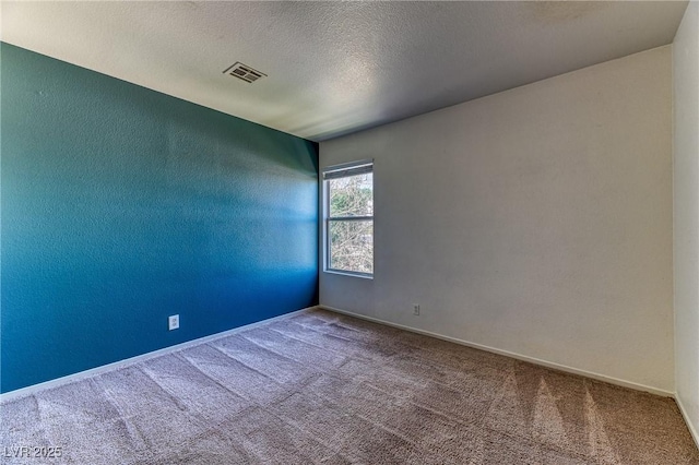 7900 Dutch Canyon Ct, Las Vegas, NV 89131 - carpeted empty room featuring baseboards and a textured ceiling