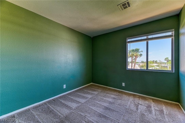 7900 Dutch Canyon Ct, Las Vegas, NV 89131 - empty room with carpet floors and a textured ceiling
