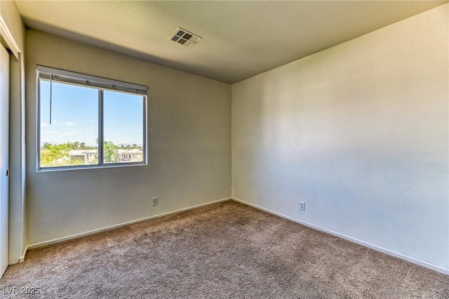 7900 Dutch Canyon Ct, Las Vegas, NV 89131 - spare room featuring carpet and baseboards