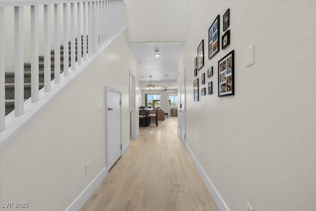 4030 Midnight Crest Ave, North Las Vegas, NV 89031 - hallway with wood finished floors, baseboards, and stairs