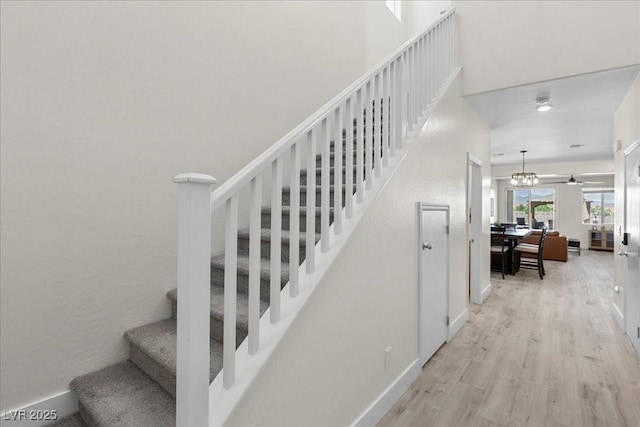 4030 Midnight Crest Ave, North Las Vegas, NV 89031 - staircase with wood finished floors and baseboards
