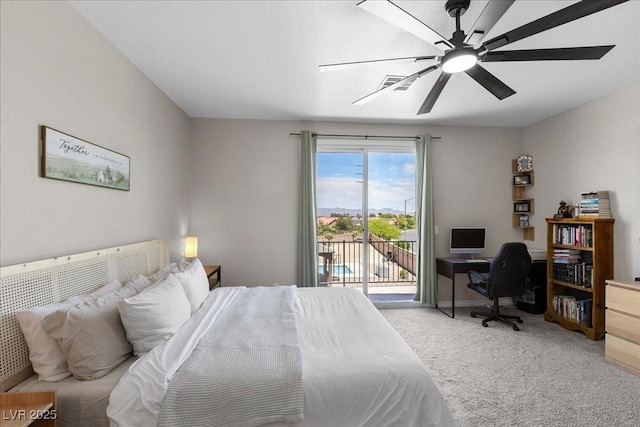 4030 Midnight Crest Ave, North Las Vegas, NV 89031 - carpeted bedroom with access to outside, a desk, ceiling fan, and baseboards