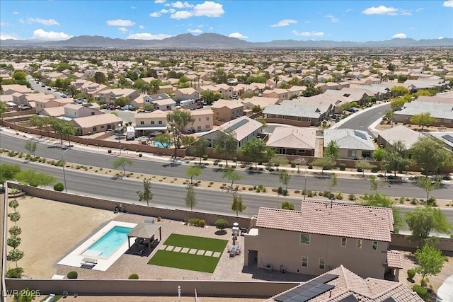 4030 Midnight Crest Ave, North Las Vegas, NV 89031 - aerial view of residential area featuring a mountain backdrop and a pool area