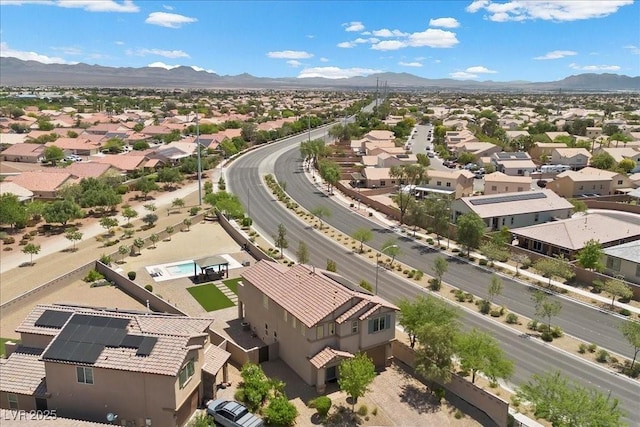 4030 Midnight Crest Ave, North Las Vegas, NV 89031 - aerial perspective of suburban area with a mountainous background