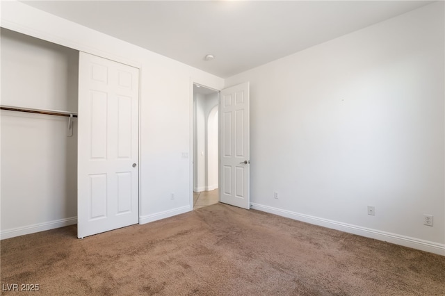 512 Los Dolces St, Las Vegas, NV 89138 - unfurnished bedroom featuring carpet flooring, a closet, and baseboards