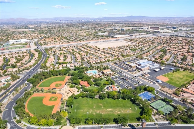 512 Los Dolces St, Las Vegas, NV 89138 - aerial view of property's location with a mountain backdrop and nearby suburban area