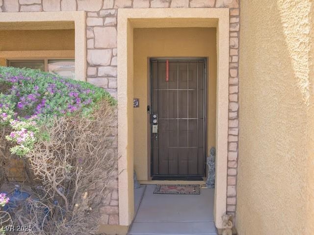 5507 Gemini Bridges St, Las Vegas, NV 89130 - property entrance with stone siding