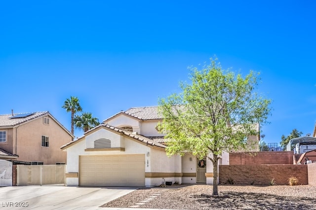 1073 Nordyke Ave, Henderson, NV 89015 - view of front of house with stucco siding, driveway, a tile roof, and a garage