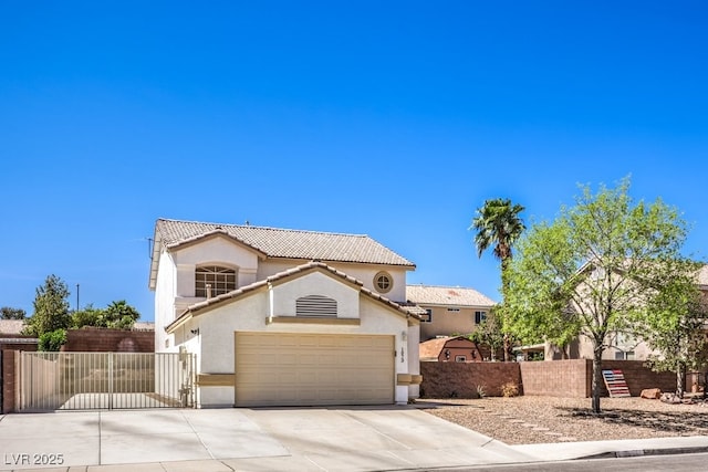 1073 Nordyke Ave, Henderson, NV 89015 - mediterranean / spanish house with stucco siding, a tiled roof, driveway, and a gate