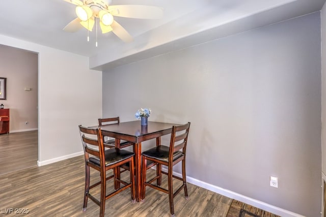1073 Nordyke Ave, Henderson, NV 89015 - dining room with ceiling fan, baseboards, and wood finished floors