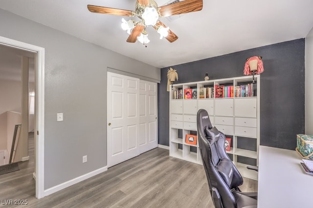 1073 Nordyke Ave, Henderson, NV 89015 - office space with ceiling fan, wood finished floors, and baseboards