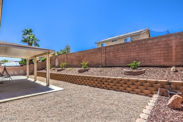 1073 Nordyke Ave, Henderson, NV 89015 - fenced backyard featuring a patio area