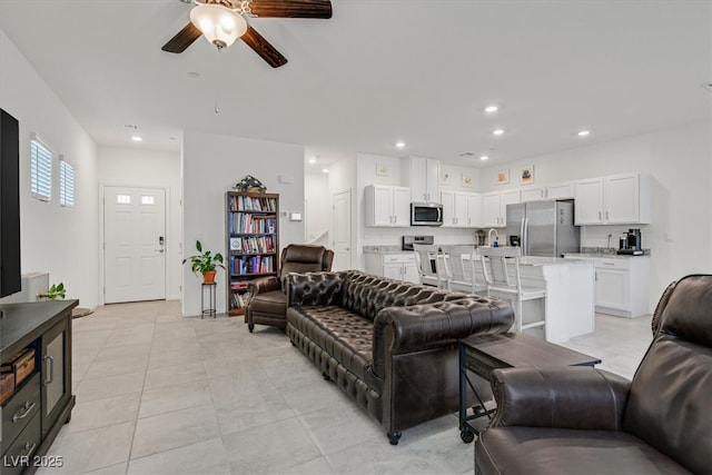 392 Canary Song Dr, Henderson, NV 89011 - living room with a ceiling fan, recessed lighting, and light tile patterned floors