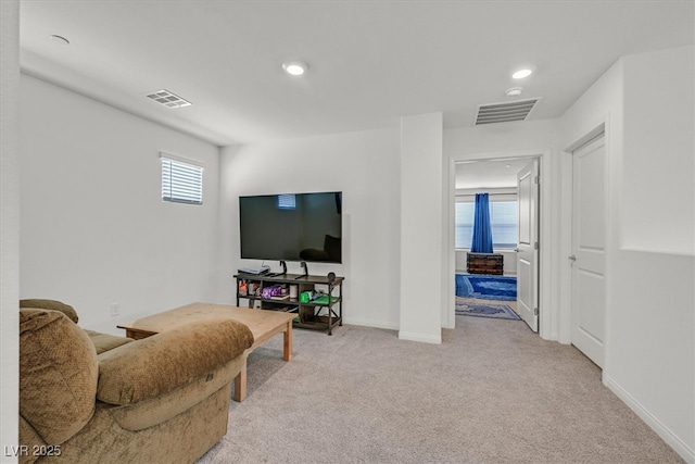 392 Canary Song Dr, Henderson, NV 89011 - living room featuring light carpet, baseboards, and recessed lighting