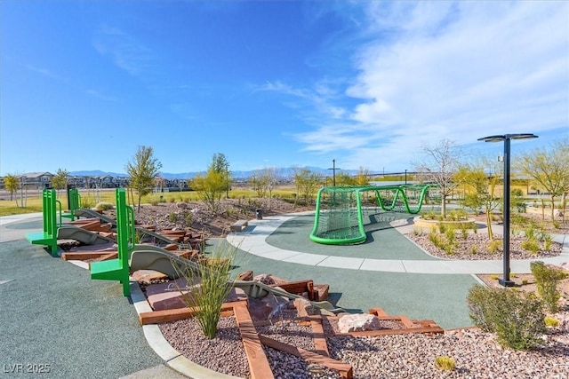 392 Canary Song Dr, Henderson, NV 89011 - community jungle gym with a mountain view