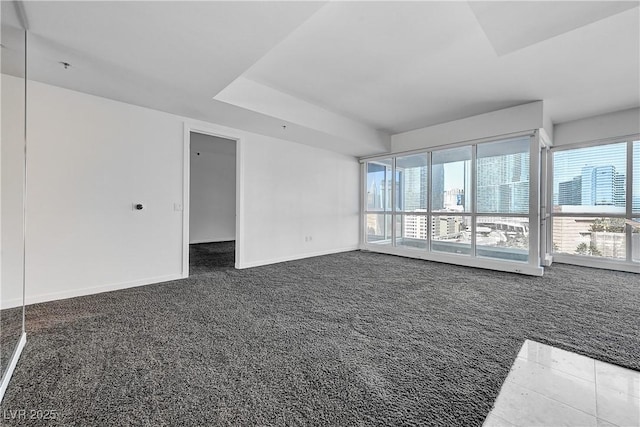 4525 Dean Martin Dr Unit 909, Las Vegas, NV 89103 - spare room with dark carpet and a pendent fire sprinkler