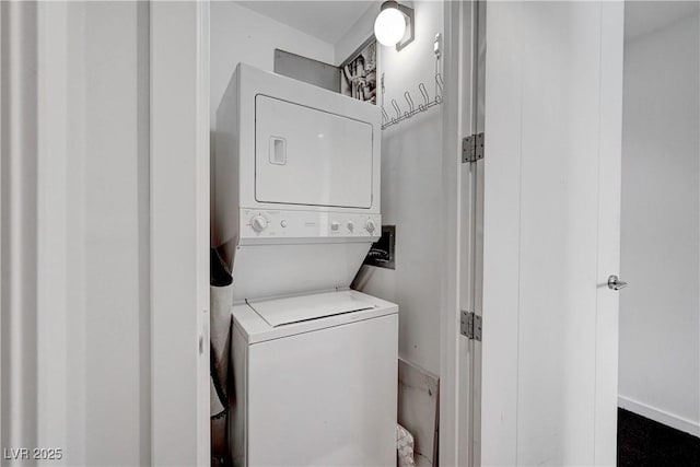 4525 Dean Martin Dr Unit 909, Las Vegas, NV 89103 - washroom featuring stacked washing machine and dryer