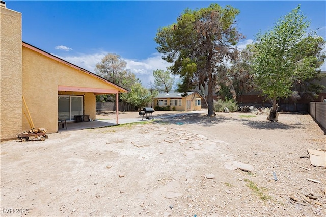 4205 Thicket Ave, North Las Vegas, NV 89031 - fenced backyard featuring a patio area
