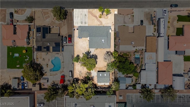4205 Thicket Ave, North Las Vegas, NV 89031 - aerial overview of property's location with a pool area