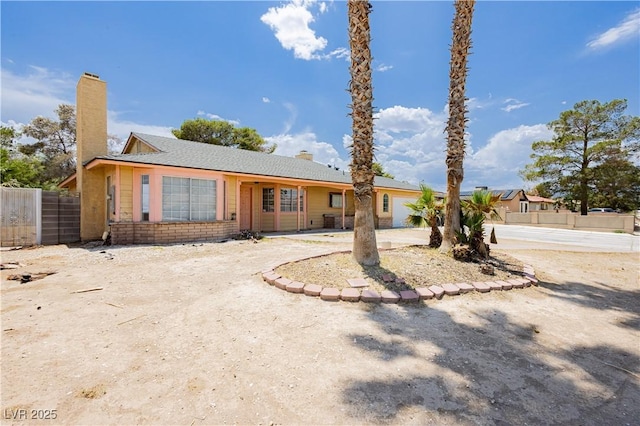 4205 Thicket Ave, North Las Vegas, NV 89031 - ranch-style house with a chimney