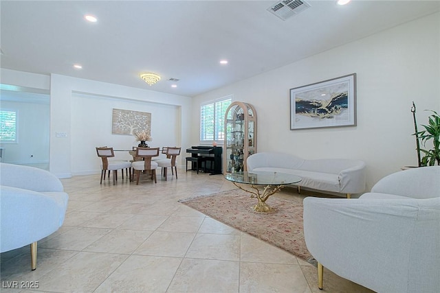 10744 Balsam Creek Ave, Las Vegas, NV 89144 - living room with healthy amount of natural light, recessed lighting, and light tile patterned floors
