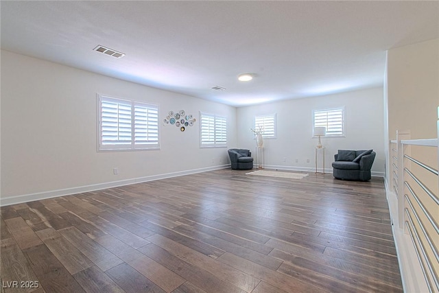 10744 Balsam Creek Ave, Las Vegas, NV 89144 - unfurnished room featuring dark wood-style floors, plenty of natural light, and baseboards
