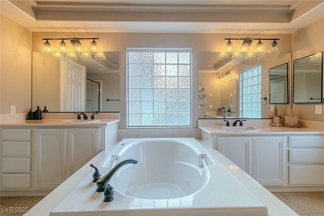 10744 Balsam Creek Ave, Las Vegas, NV 89144 - full bathroom featuring two vanities and a whirlpool tub
