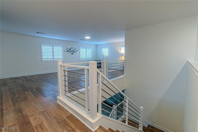 10744 Balsam Creek Ave, Las Vegas, NV 89144 - hallway featuring an upstairs landing, wood-type flooring, recessed lighting, and baseboards