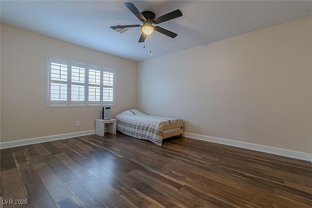 10744 Balsam Creek Ave, Las Vegas, NV 89144 - bedroom featuring dark wood-style floors, baseboards, and ceiling fan