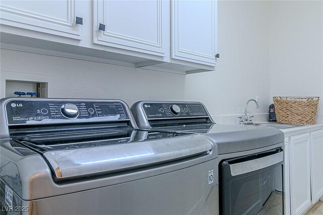 10744 Balsam Creek Ave, Las Vegas, NV 89144 - laundry area featuring washing machine and clothes dryer and cabinet space