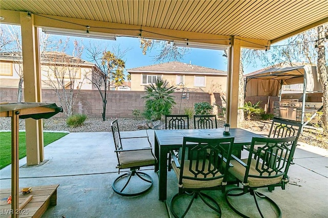 10744 Balsam Creek Ave, Las Vegas, NV 89144 - fenced backyard featuring outdoor dining space, a patio, and a grill