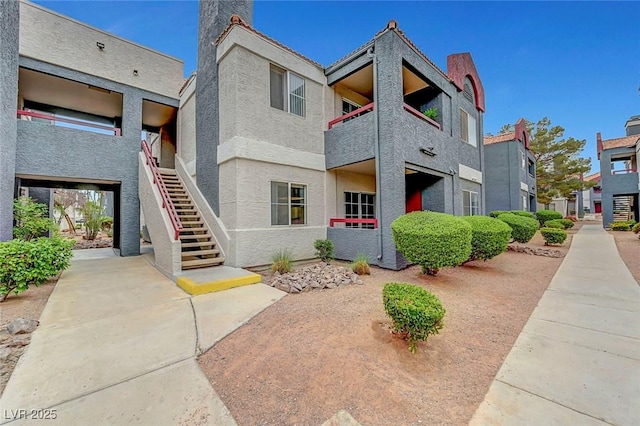 8600 W Charleston Blvd Unit 1128, Las Vegas, NV 89117 - view of building exterior with stairway