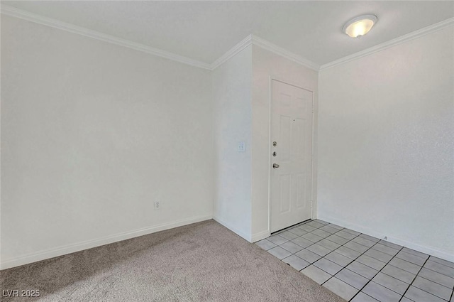 8600 W Charleston Blvd Unit 1128, Las Vegas, NV 89117 - spare room featuring crown molding, light carpet, and baseboards