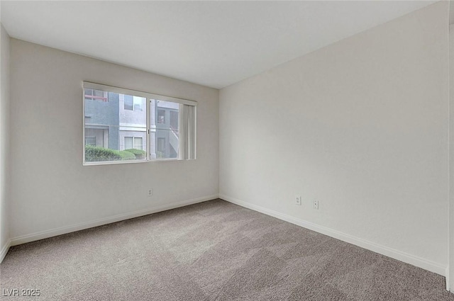 8600 W Charleston Blvd Unit 1128, Las Vegas, NV 89117 - carpeted empty room featuring baseboards