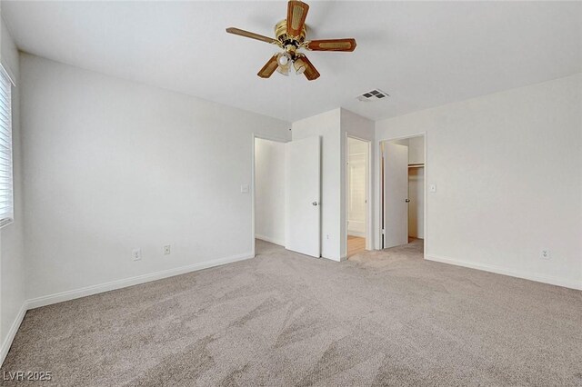 8600 W Charleston Blvd Unit 1128, Las Vegas, NV 89117 - unfurnished bedroom with carpet, baseboards, and multiple windows