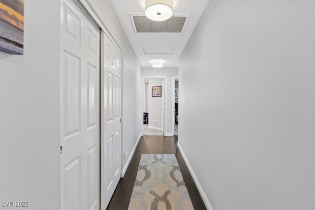 600 Beresford Ave, Las Vegas, NV 89123 - hallway with dark wood-type flooring and baseboards