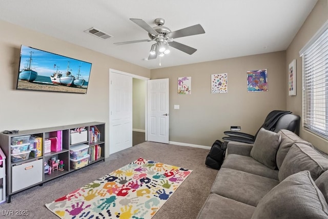 600 Beresford Ave, Las Vegas, NV 89123 - carpeted living area featuring a ceiling fan and baseboards