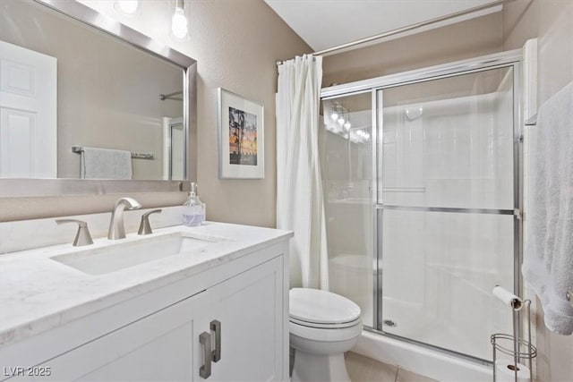 600 Beresford Ave, Las Vegas, NV 89123 - full bathroom featuring toilet, a stall shower, vanity, and tile patterned flooring